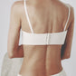 Back detail of the beige bra top showing the adjustable dual-row hook closure