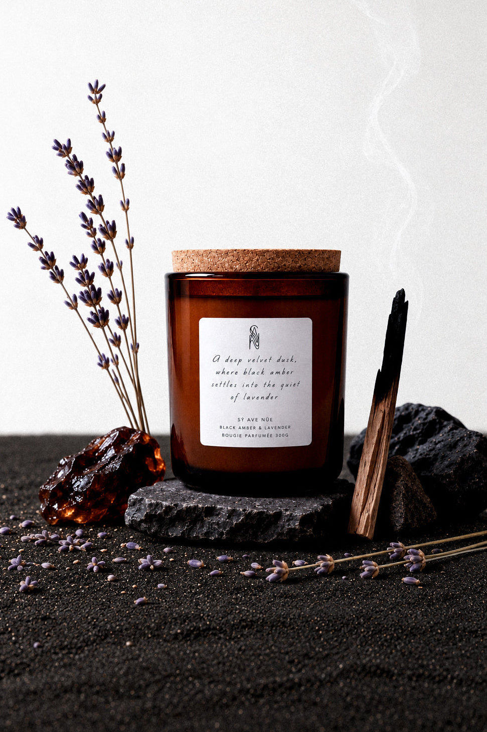 Black Amber and Lavender scented soy blend candle in an amber glass vessel by sý ave nüe