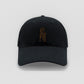 Black cotton baseball cap with brown embroidered sý ave nüe logo and curved peak