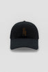 Black cotton baseball cap with brown embroidered sý ave nüe logo and curved peak