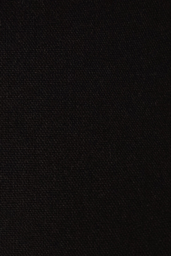 Close-up of Black linen cotton fabric used for the Sý Bra Top showing its woven texture