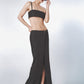 Woman wearing a Black linen cotton maxi skirt with matching crop top