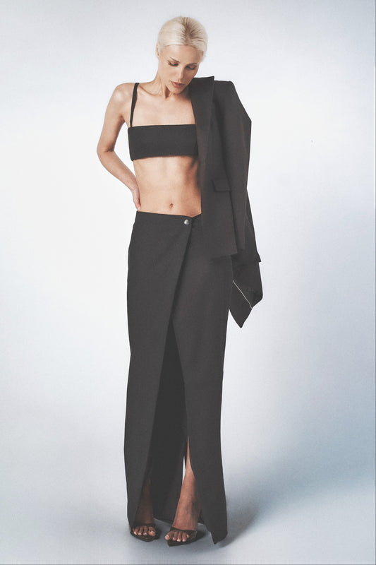 Front view of the Black low-waist maxi skirt with centre-front slit