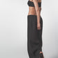 Side view of the Black linen cotton maxi skirt showing the low-waist fit