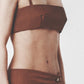 Back view of the brown bra crop top showing the slim straps and fitted shape