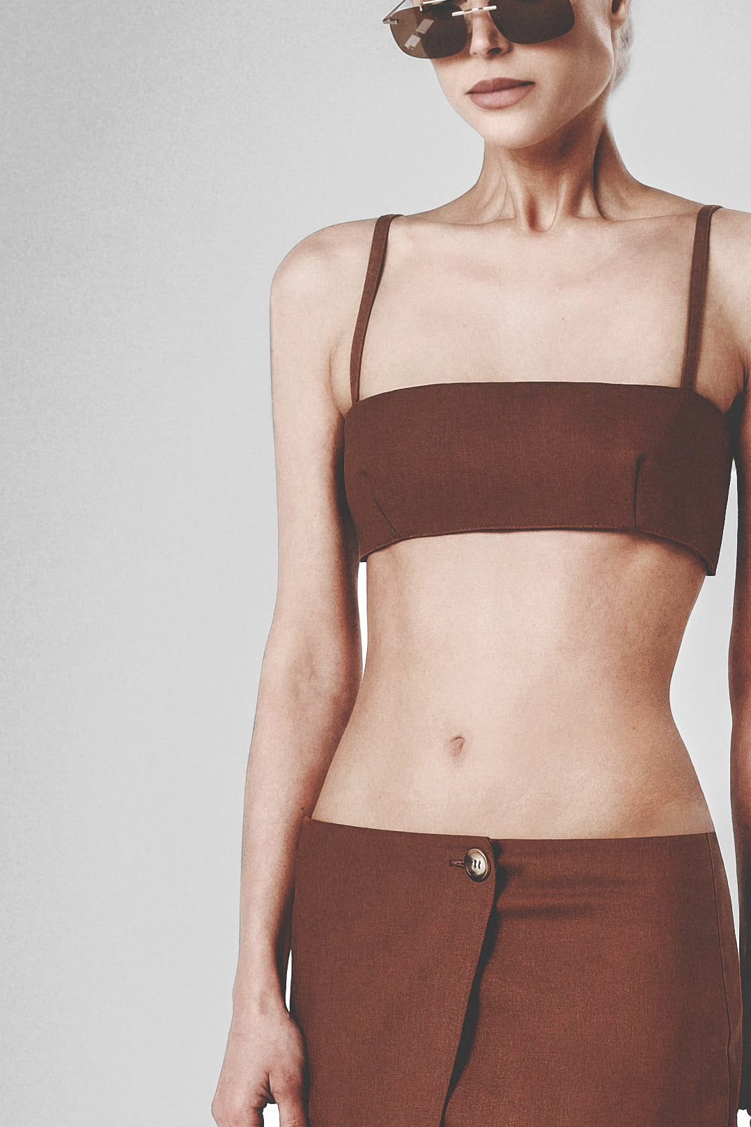 Front view of the brown linen bra crop top with slim shoulder straps