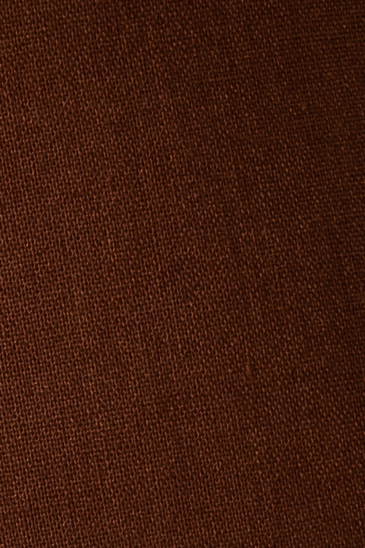 Close-up of Cacao brown linen cotton fabric showing its natural woven texture