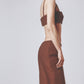 Side profile of the brown linen cotton maxi skirt with matching bra top