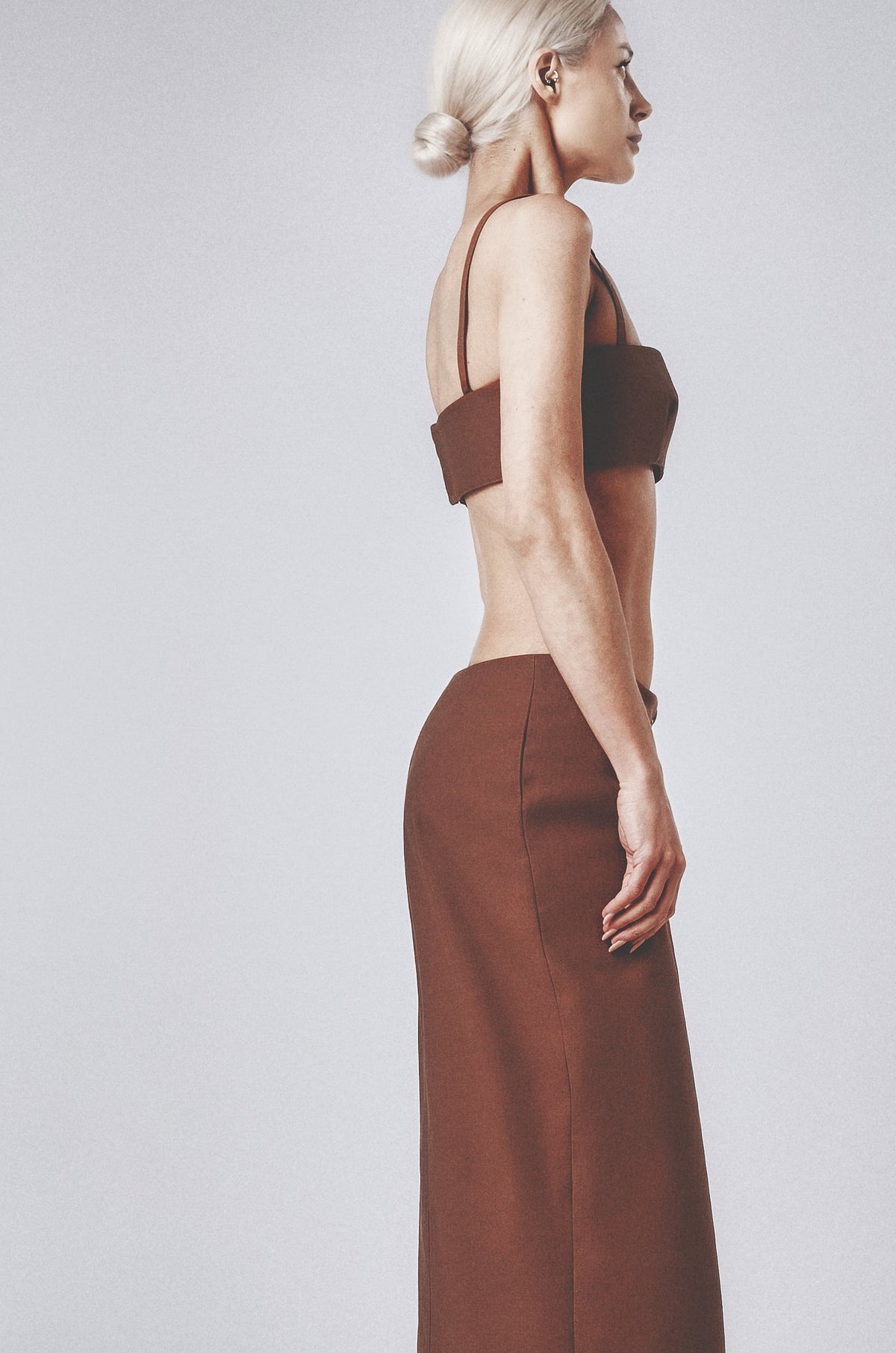 Side profile of the brown linen cotton maxi skirt with matching bra top
