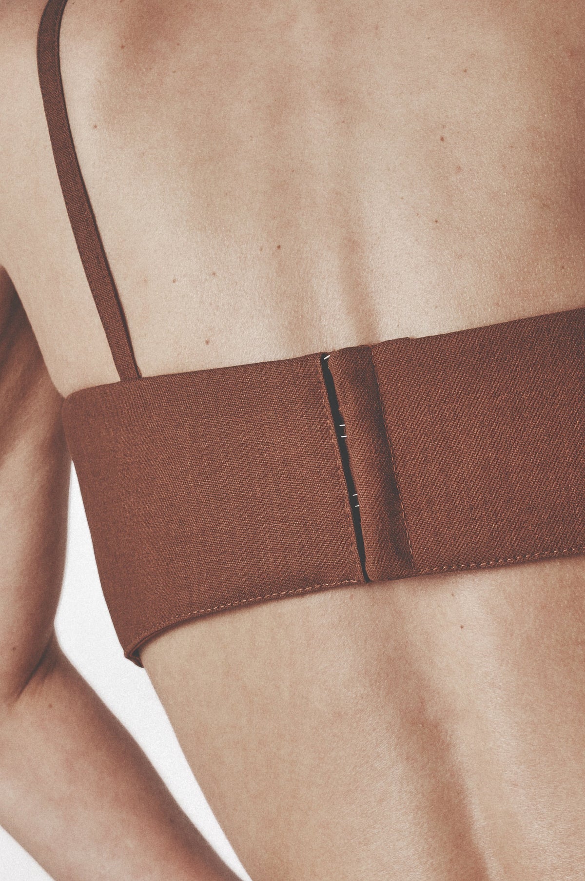Back detail of the Cacao bra top showing the adjustable dual-row hook closure