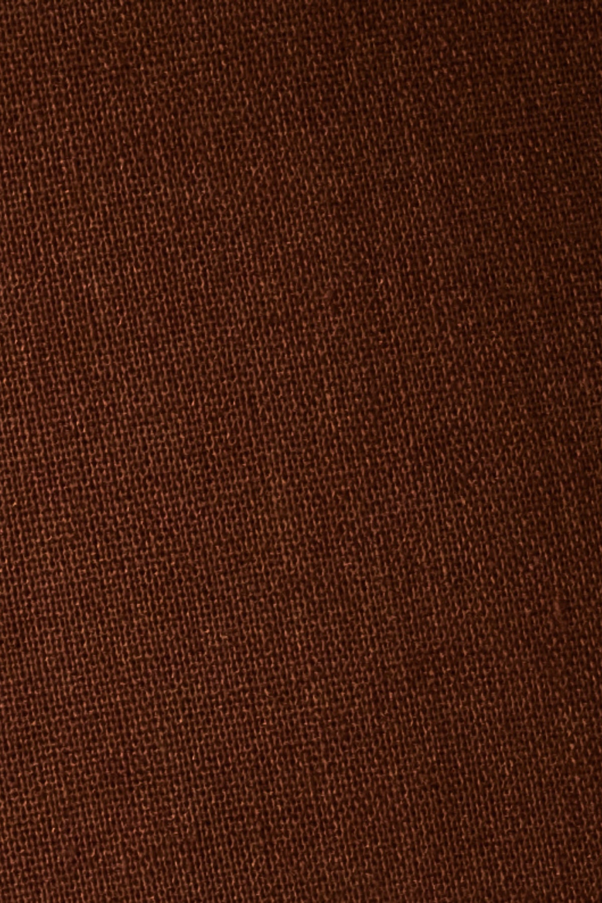 Close-up of Cacao brown linen cotton fabric showing its natural woven texture