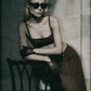 Woman wearing a Cacao brown maxi skirt and matching crop top in an editorial image