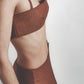 Side view of the Cacao linen cotton bra top showing its close structured fit