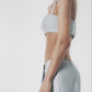 Side profile of a light blue linen cotton maxi skirt with matching crop top
