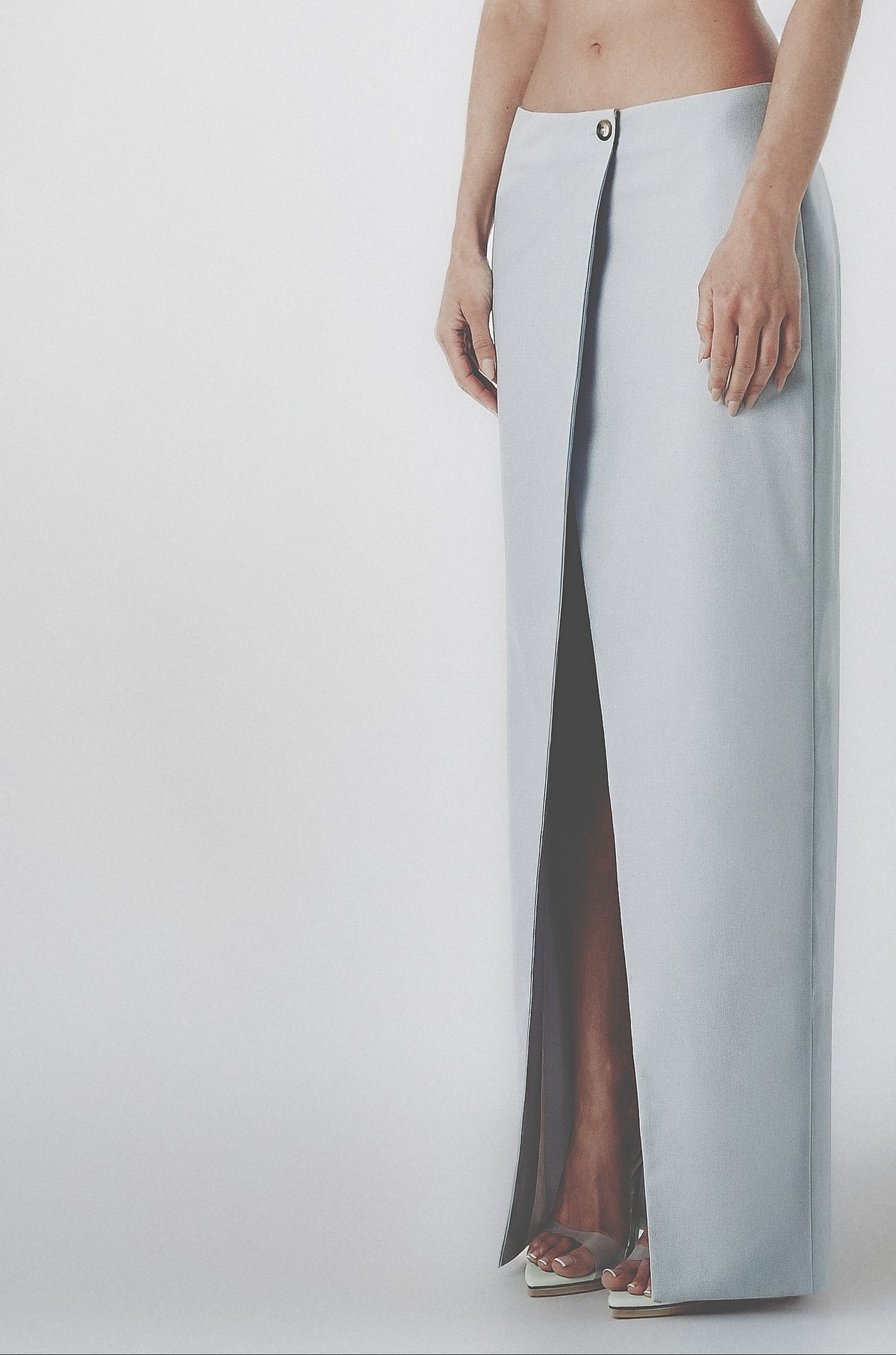 Light blue full-length maxi skirt with a straight structured cut