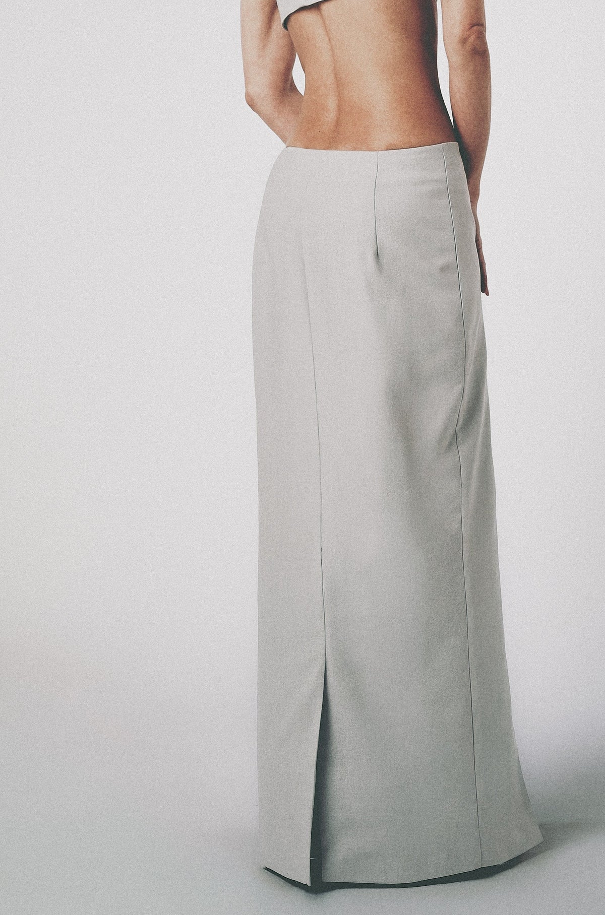Light grey low-rise maxi skirt in structured linen cotton with matching crop top