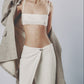 Sand linen bra top styled with a blazer and matching low-waist maxi skirt