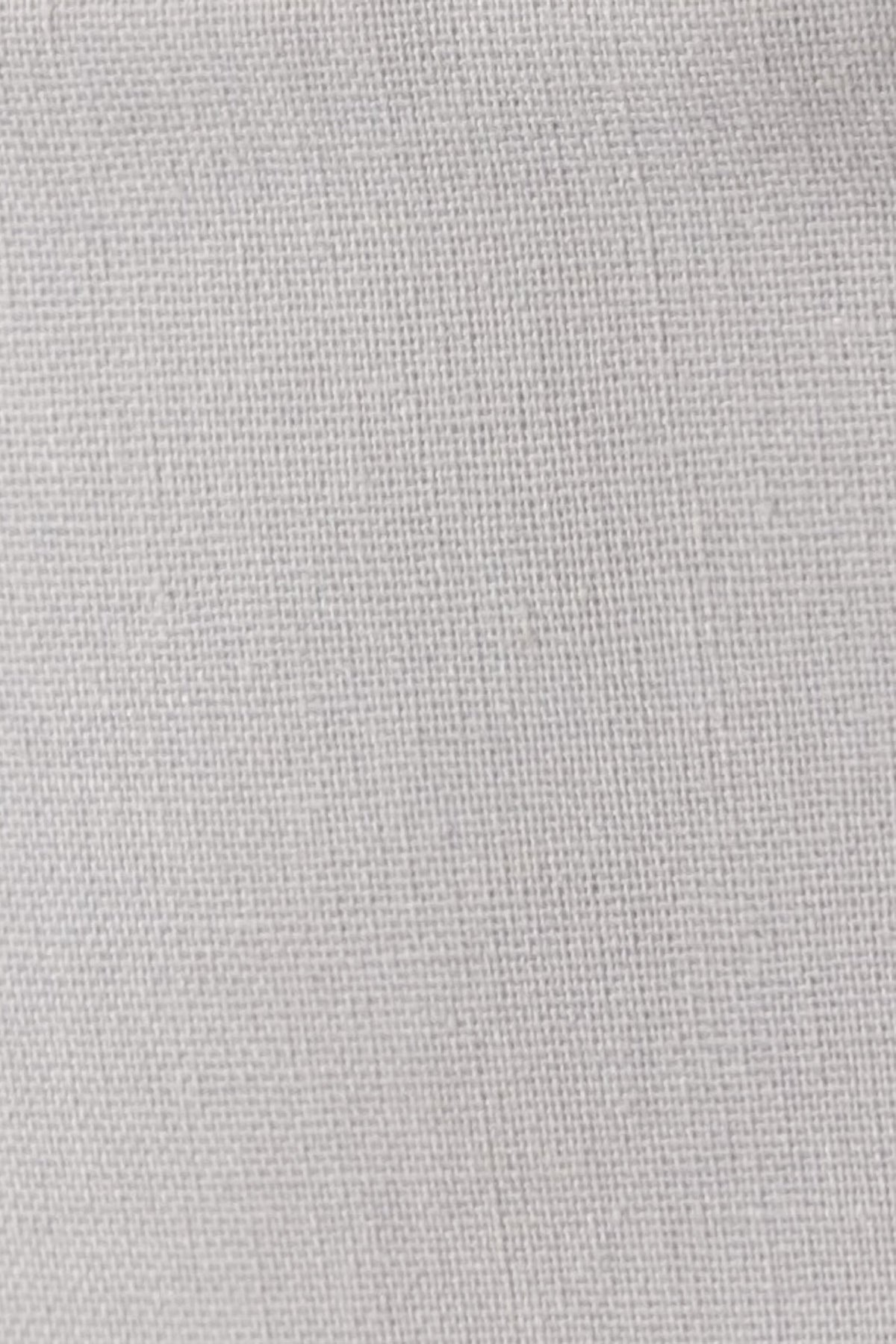 Close-up of Silver light grey linen cotton fabric showing its natural woven texture