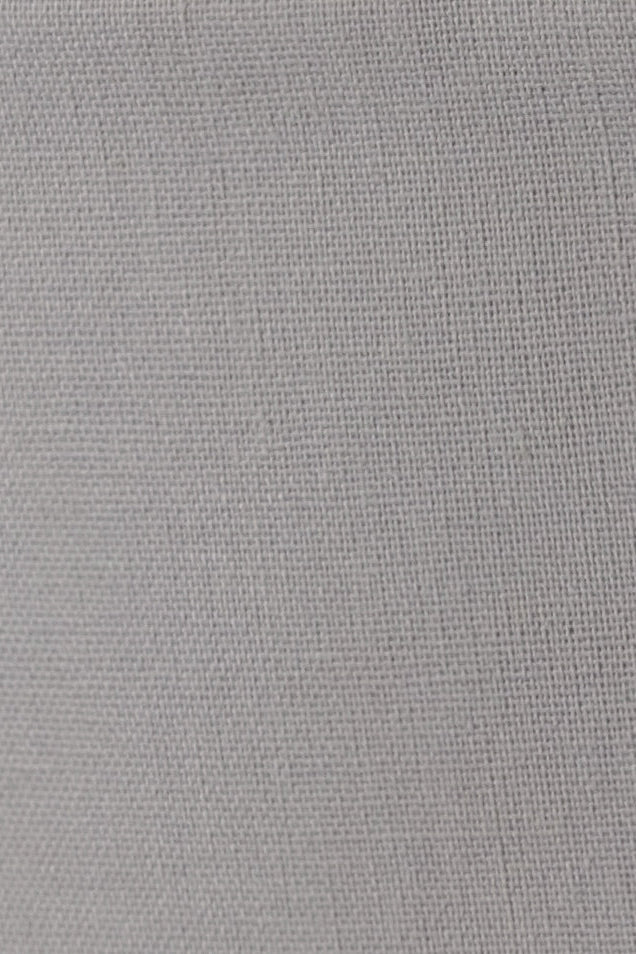 Close-up of the Silver light grey linen cotton fabric showing its natural woven texture