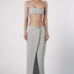 Woman wearing the Silver light grey linen cotton maxi skirt with matching bra crop top