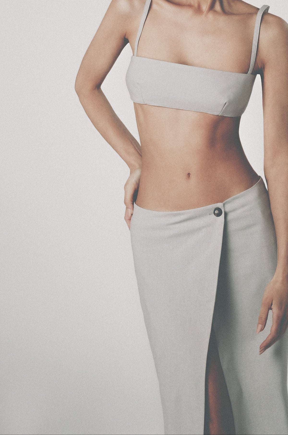 Close view of Silver linen cotton maxi skirt showing the low waist and front button closure
