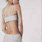 Silver maxi skirt styled with the matching structured bra crop top