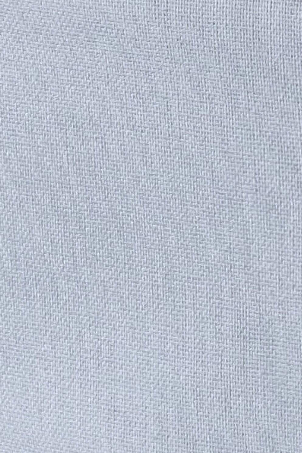 Close-up of Sky Blue linen cotton fabric showing its natural woven texture