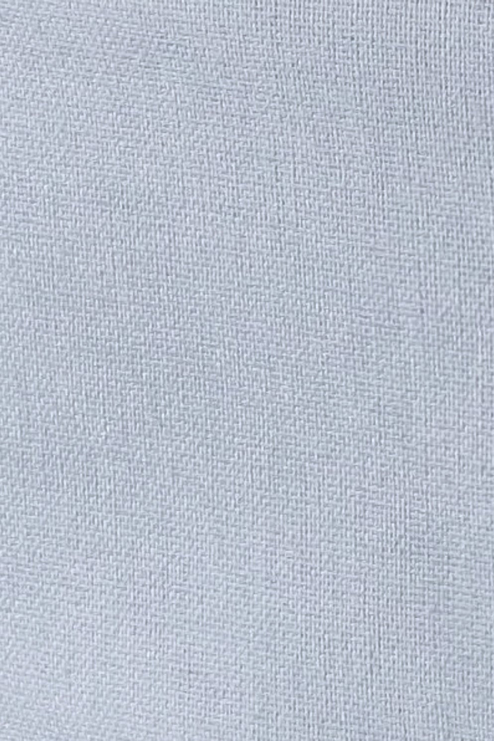 Close-up of Sky Blue linen cotton fabric showing its natural woven texture