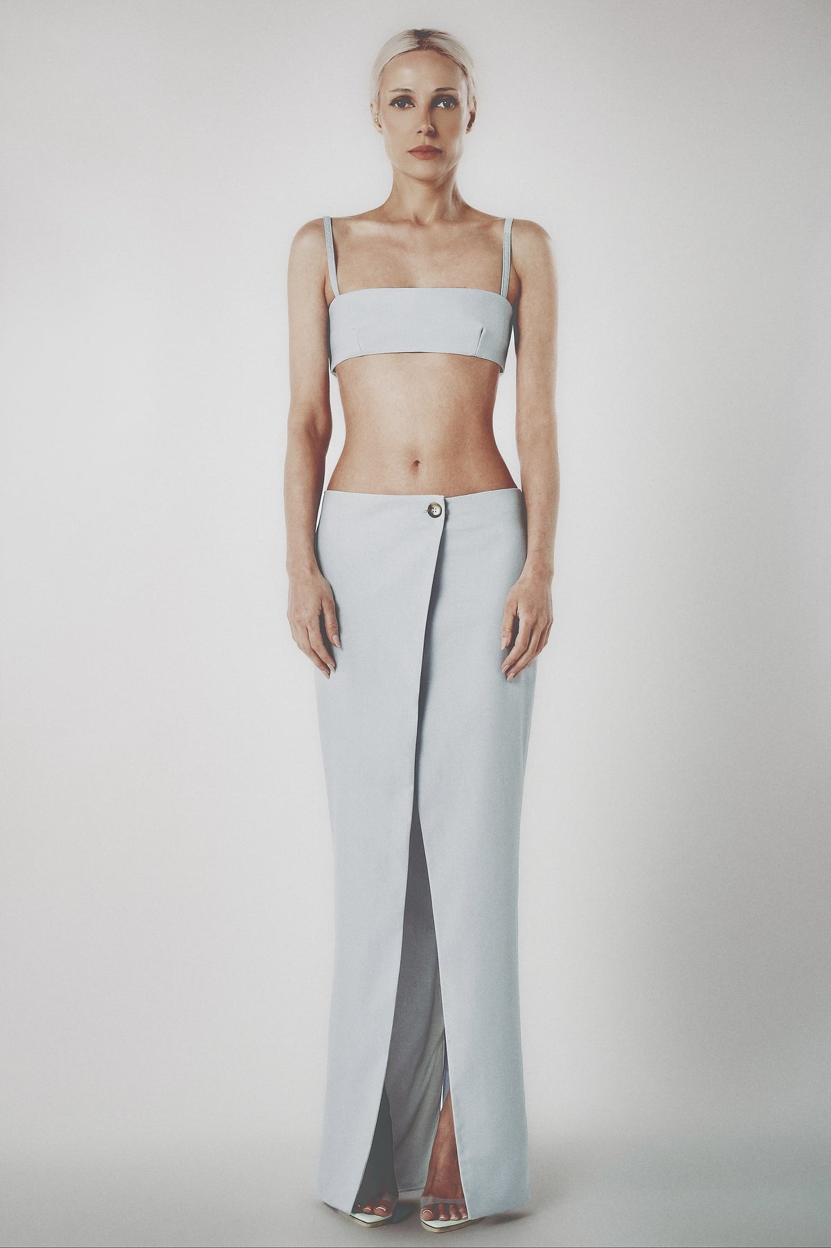 Woman wearing the Sky Blue linen cotton maxi skirt with matching bra crop top