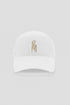 White cotton baseball cap with cream embroidered sý ave nüe logo and curved peak
