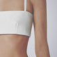 Side view of the White linen cotton crop top showing its close structured fit