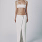 Woman wearing the White linen cotton maxi skirt with matching bra crop top