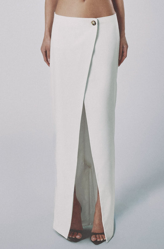 Front view of the White low-waist linen cotton maxi skirt with button closure