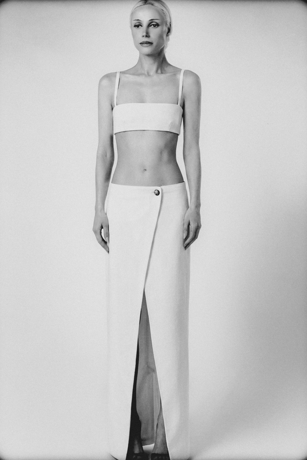 White maxi skirt styled with the matching Sý Bra Top